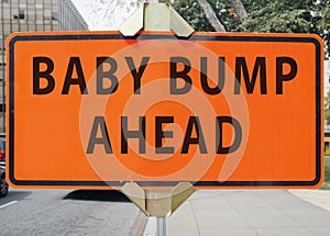 BABY BUMP AHEAD road sign.