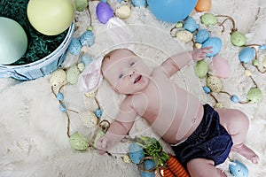 Baby with bunny ears on an Easter Set