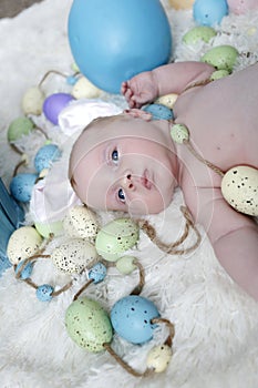 Baby with bunny ears on an Easter Set