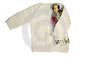 Baby cardigan and doll