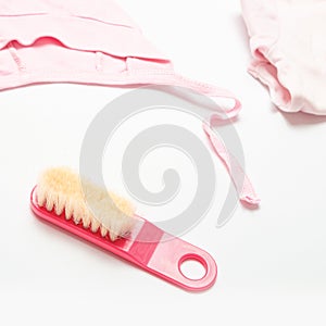 Baby care and health concept. Kids things. a set of children`s items and accessories. hairbrush on a white background