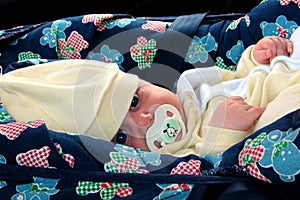 Baby in carseat photo