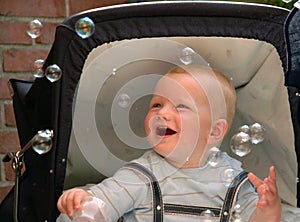 Baby Catching Bubbles