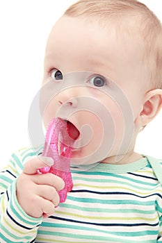 Baby with chew toy photo