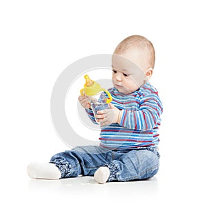 Baby child drinking from bottle