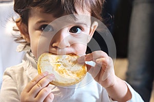 Baby child eat carbohydrates newborn eating face closeup portrait unhealthy diet for kids