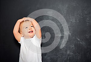 Baby child and empty Blackboard