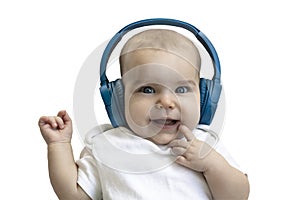Baby, child, toddler happy smiling in wireless blue headphones on a white background. The concept of technology learning from