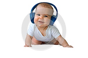 Baby child Toddler Happy smiling in wireless blue headphones on a white background. The concept of technology learning from birth
