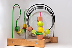 Baby child wooden educational toy with looped wires for teaching coordination