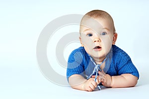 Baby close up on a gray background