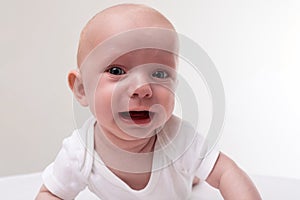 baby close-up on a white background crying