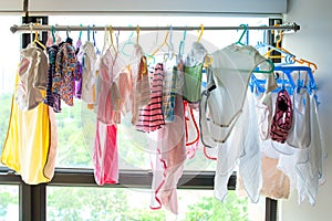 Baby clothes hangs on