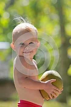 Baby and coconut