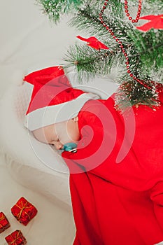 Baby in a cocoon new year . An article about the new year. An article about children. The first new year of the baby