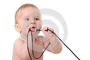 Baby with computer wires isolated on white