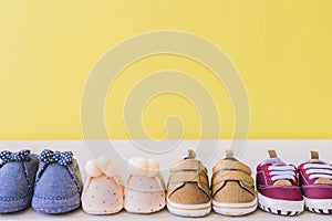 baby concept with different pairs shoes. High quality beautiful photo concept