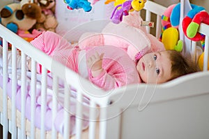 Baby in a cot