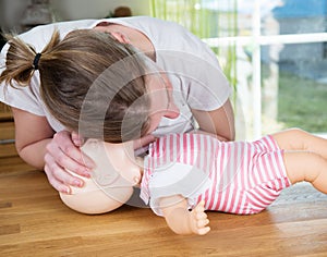 Baby CPR check for signs of breathing