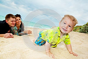 Baby crawling at the beach