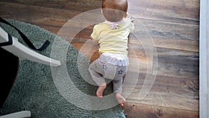 Baby crawling on floor toddler exploring home curious infant having fun