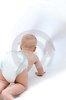 Baby crawling to unfamiliar hands