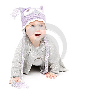 Baby Crawling on White, Happy Kid in Wool Hat, Beautiful Girl Portrait