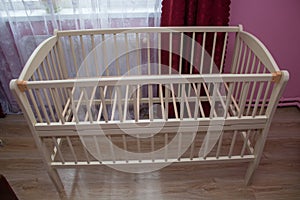 Baby crib without mattress,In the bedroom the parents prepared a baby crib for the baby