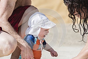 Baby Cries and Mother and Father Offer Comfort