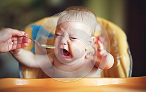Baby cry, capricious, refuse to eat photo