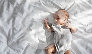 Baby Daytime Sleep. Cute Adorable Little Infant Child Sleeping In Bed