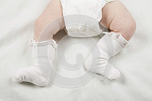 Baby In Diaper And Socks