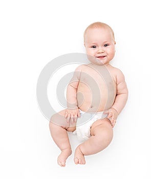 Baby in diaper on white background smile