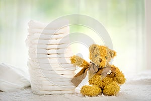 Baby diapers and teddy bear, accessories changing baby