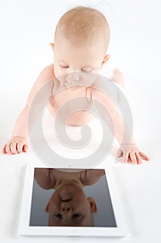 Baby with digital tablet