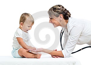 Baby and doctor isolated on white background