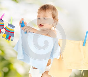 Baby doing laundry