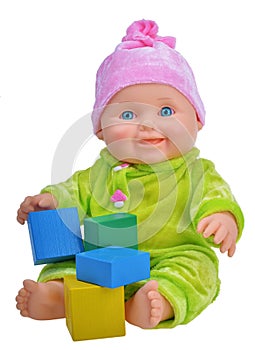 Baby doll playing with cubes