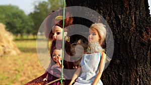 Baby dolls in rustic old phase. Ancient princess doll holding on iron can. Childhood life and playing toys concept