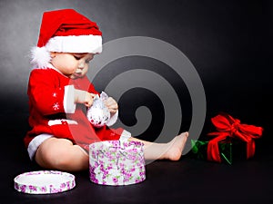 Baby dressed as Santa