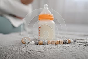 Baby drinking bottle, with milk hypoallergenic adapted infant formula or milk for feeding baby, pacifier clip with