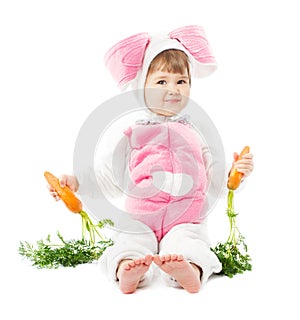 Baby in easter bunny costume with carrot, kid girl rabbit hare