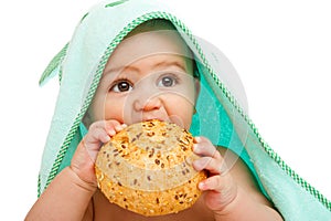 Baby eating bun