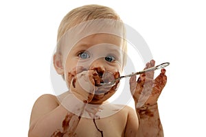 Baby eating chocolate