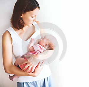 Mother breastfeeding newborn baby child