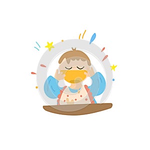 A baby eats from a plate without a spoon