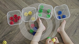 baby educational game learning colors, sorting colorful toys in different boxes