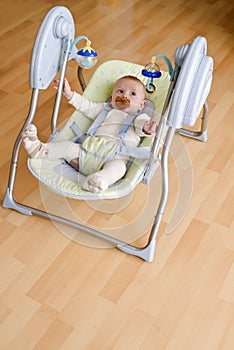Baby in electronic swing