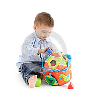 Baby enjoying developmental toy photo