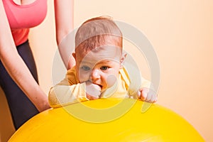 Baby exercises on fitball